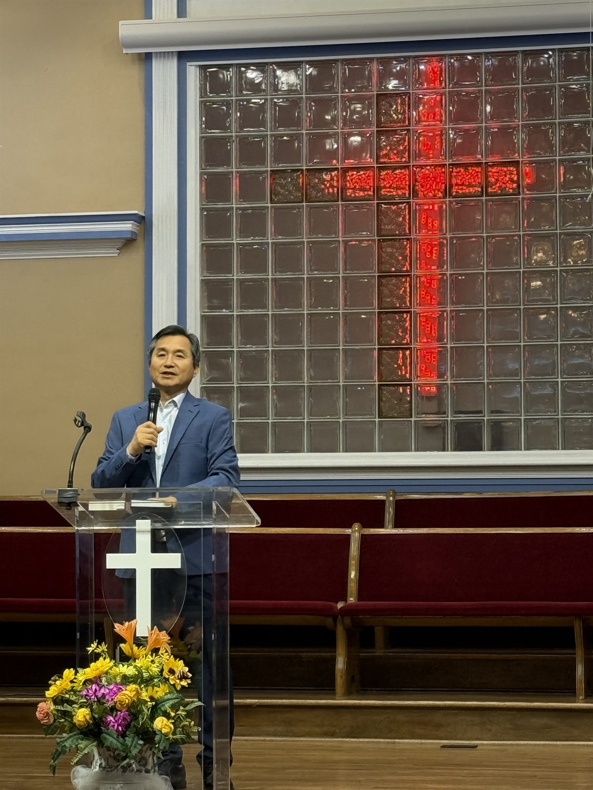 Pastor John speaking at Charlotte New Hope Church